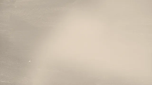 Ein texturierter, neutraler Hintergrund.